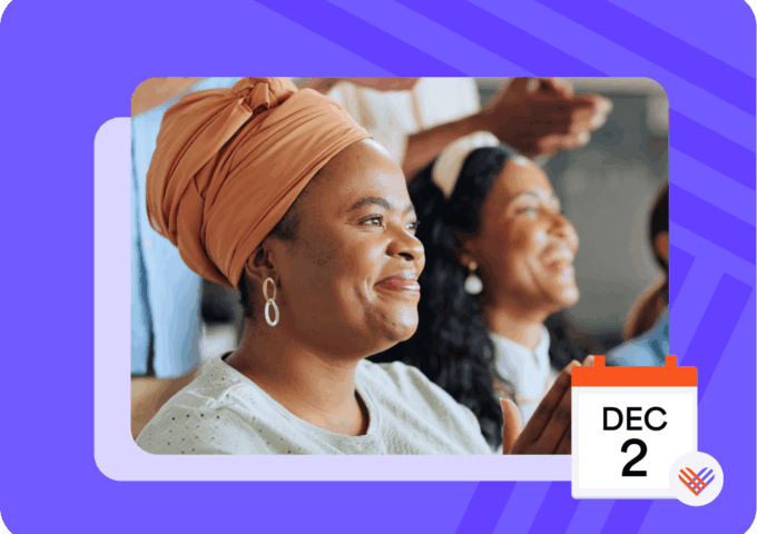 Women smiling and looking toward something with a calendar illustration showing Dec 2